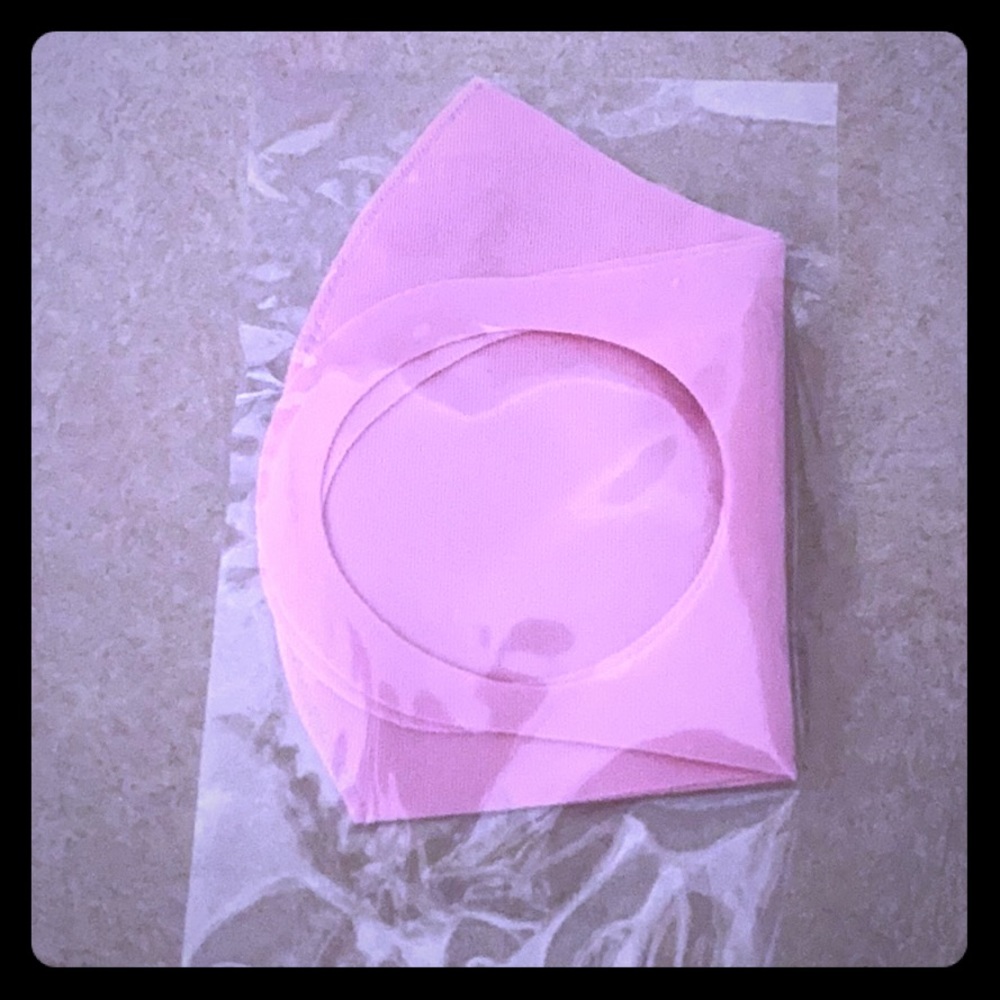 20 Breathable 1 ply light pink face mask.